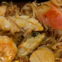 Seafood Pad Thai  · Favorite rice noodles stir-fried with mixed seafood, cabbage, egg, bean sprouts, and scallio...