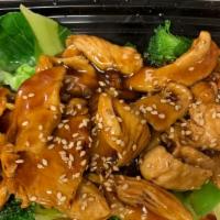 Teriyaki Chicken · Marinated and grilled white meat chicken with thai style teriyaki sauce served over mix vege...