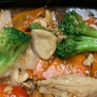 Cashew Stir Fry · Cashews, carrots, onions, broccoli, and bell peppers stir-fried in garlic brown sauce.