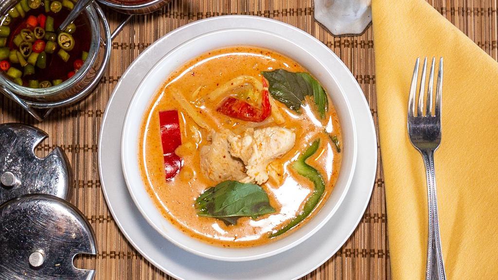 Red Curry · Red curry sauce with coconut milk, prepared with bamboo strips, bell peppers.