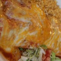 Burrito Dinner · 10” Burrito stuffed with beans, protein, topped with sauce, shredded cheese served with rice...