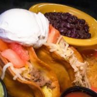 Puffy  Taco Dinner · Two deep-fried flour tacos with your choice of protein, topped with lettuce, shredded cheese...