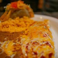 Rio Grande · Build a 10” burrito fill with beans, choice of protein, topped with sauce, melted shredded c...
