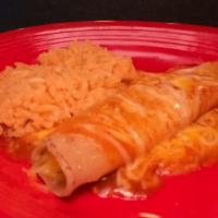 Kids Enchilada  · Kids enchilada topped with enchilada sauce, melted shredded cheese stuffed with your choice ...
