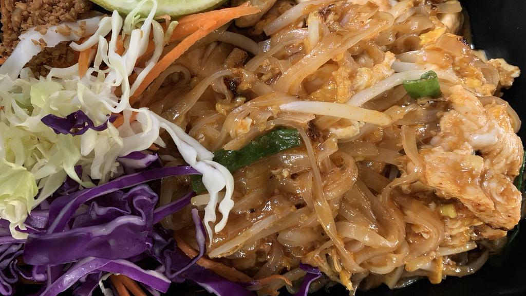 Pad Thai Noodle · One of Thailand's best known noodle dishes pan-fried rice noodles with your choice of meat, egg, ground peanuts, bean sprouts and green onions.