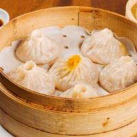 Pork Soup Dumplings 功夫小笼包 · We are the only place you can get REAL soup dumplings in town. There is real soup in the dum...