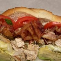 The Eastside Club Wrap · Grilled Chicken, Avocado, Tomato, Bacon,  Mozzarella, Bacon Dressing