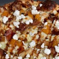 Roasted Roots · Butternut squash, caramelized onions, bacon, goat cheese, fig infused balsamic glaze