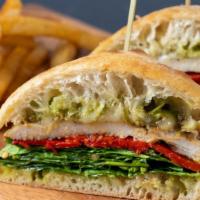 Tuscan Chicken · Grilled chicken breast, Provolone cheese, roasted red pepper, spinach, tomato, and basil pes...