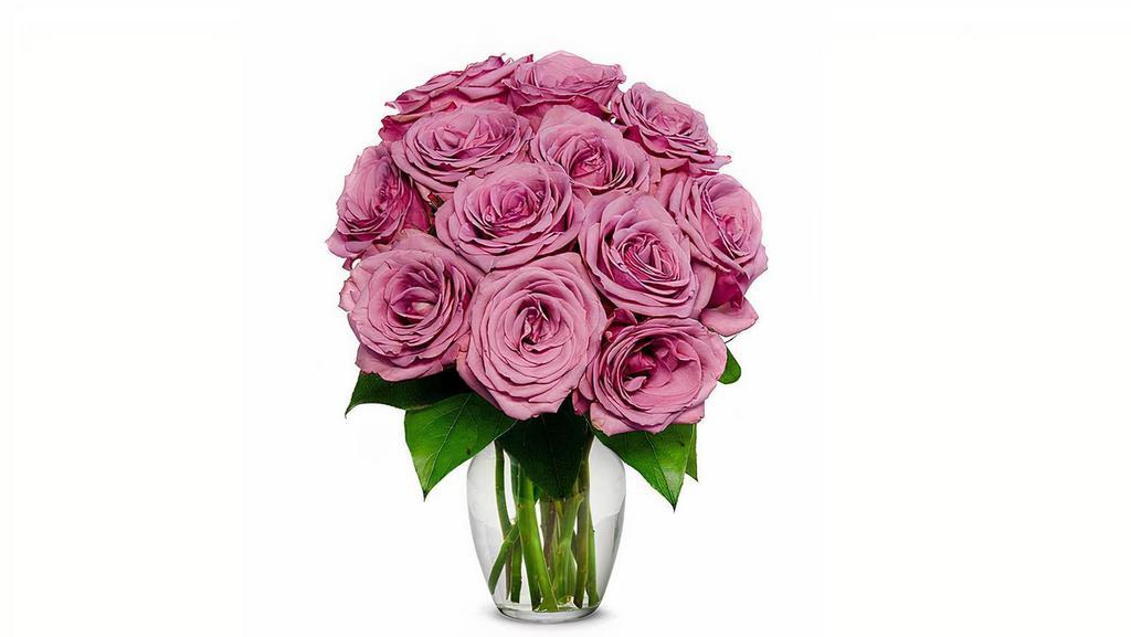 Purple Roses Bouquet · 😉 12 stems Purple roses. 
 A popular and always beautiful gift to send. These purple roses are a statement that is sure to make the recipient smile!
