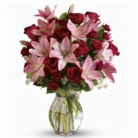 Lavish Love  · Lovely reds and pinks come together in this lavishly romantic anniversary gift. Sweetly sent...