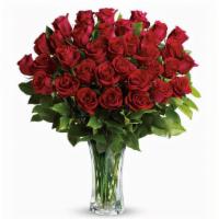 Long Stemmed  Red Roses · 36 stems Long Stemmed Premium Royal Red Roses in a sparkling cut crystal vase.