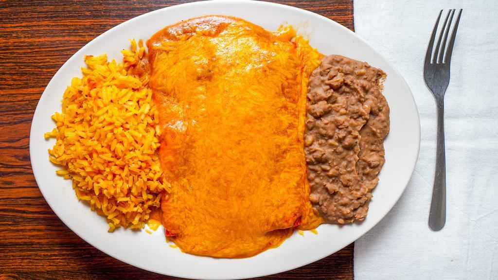 #14. Cheese Enchiladas · 3 cheese enchiladas toped w/mexican gravy sauce & melted cheese served w/rice, beans & 2 tortillas