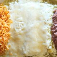#16. Enchiladas Verdes · 3 green enchiladas toped w/ green sauce & melted Monterrey cheese served w/ rice, beans & 2 ...