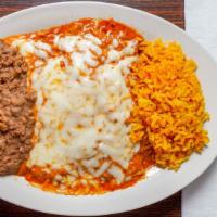 #18. Enchipotladas Plate · 3 enchiladas filled w/Monterrey cheese, beef or chicken dressed w/ our special creamy- chipo...