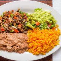 #3. Carne A La Mexicana · Mixed w/ onions,tomatoes & jalapeños served w/rice, beans, guacamole salad & 2 tortillas