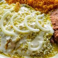 #13. Enchiladas Mayito · A steak toped w/ 3 green enchiladas dreseed w/ our special home style sauce, queso fresco & ...