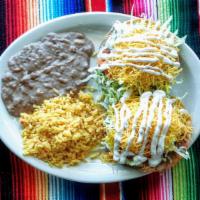  Chalupas Plate · 2 chalupas toped w/beans,your choice of meat, lettuce, tomatoes,cheese & sour cream served w...