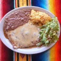 #8 Pechuga Flameada · Chicken breast toped w/ranchero sauce & melted Monterrey cheese served w/rice, beans, guacam...