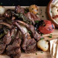 Lamb Chops Family Meal · New Zealand (9 pcs) lamb chops, Served with rice, hummus, grilled vegetables, and a pack of ...