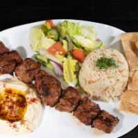 Beef Kebab Plate · Served with rice, hummus, salad and one pita bread.