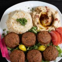Falafel Plate (6 Pcs) · Served with hummus, rice or pickles and two pita bread.