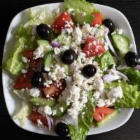 Greek Salad · Lettuce, tomatoes, cucumbers, onions, black olives, and feta cheese.