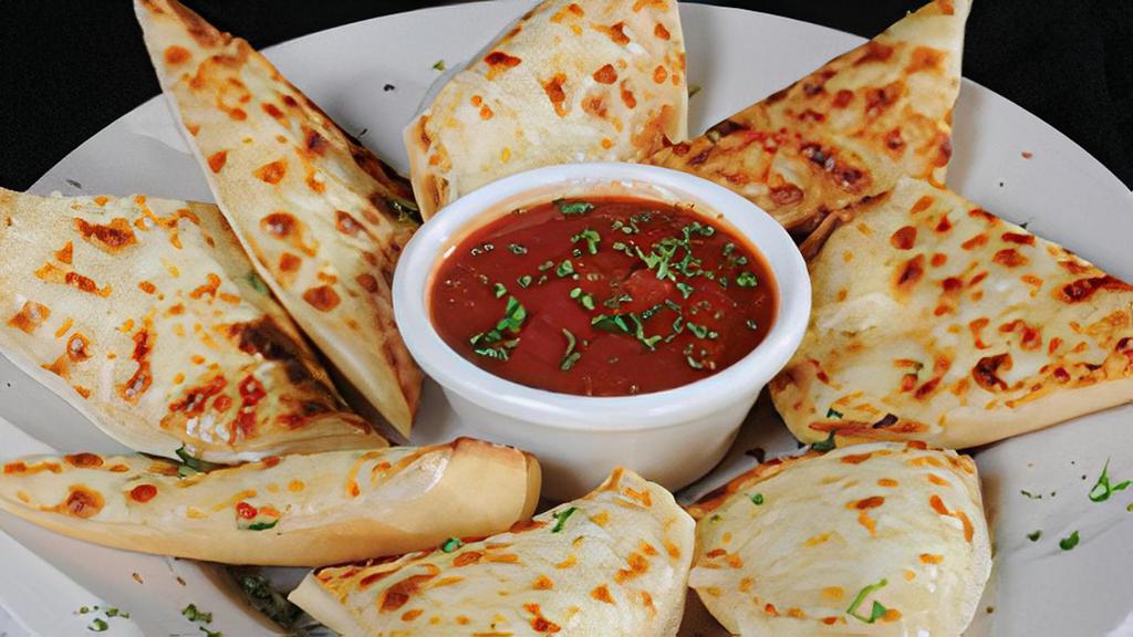 Cheese Bread · Fresh Italian bread covered with a blend of mozzarella cheese, garlic and Italian seasoning, baked to perfection and served with our signature pizza sauce. THursday enter promo code 