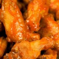 30 Traditional Wings · Crispy bone-in wings tossed in your choice of sauce: Parmesan Garlic, Sweet Chili, Buffalo, ...