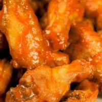 5 Traditional Wings · Crispy bone-in wings tossed in your choice of sauce: Parmesan Garlic, Sweet Chili, Buffalo, ...