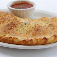 Individual Buffalo Jack Calzone · Mozzarella & ricotta cheese, red onion, red bell pepper, and buffalo style chicken.