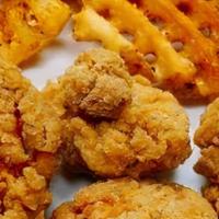 Kids Chicken Bites · 6 oz of boneless wings served plain or shaken in your choice of wing sauce.  Served with one...