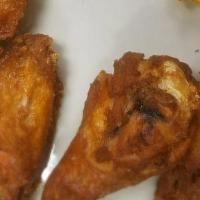 Kids Bone-In Wings · 4 bone in wings served plain or shaken in your choice of wing sauce.  Served with one kids s...