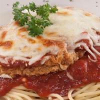 Chicken Parm Pasta · A grilled or breaded chicken breast topped with marinara sauce, Parmesan and mozzarella chee...