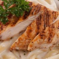 Fettuccini · Fettuccini served with your choice of alfredo or marinara sauce, a side salad, and garlic ro...