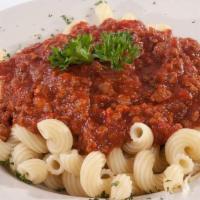 Cavatappi · Corkscrew pasta served with  your choice of sauce, a side salad, and garlic roll.  Customize...