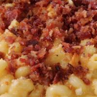 Mac N Cheese · Our homemade, rich and creamy cheese sauce with Cavatappi pasta, a side salad, and garlic ro...