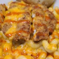 Buffalo Chicken Mac · Our homemade, rich & creamy cheese. sauce with Cavatappi pasta topped with crispy chicken & ...