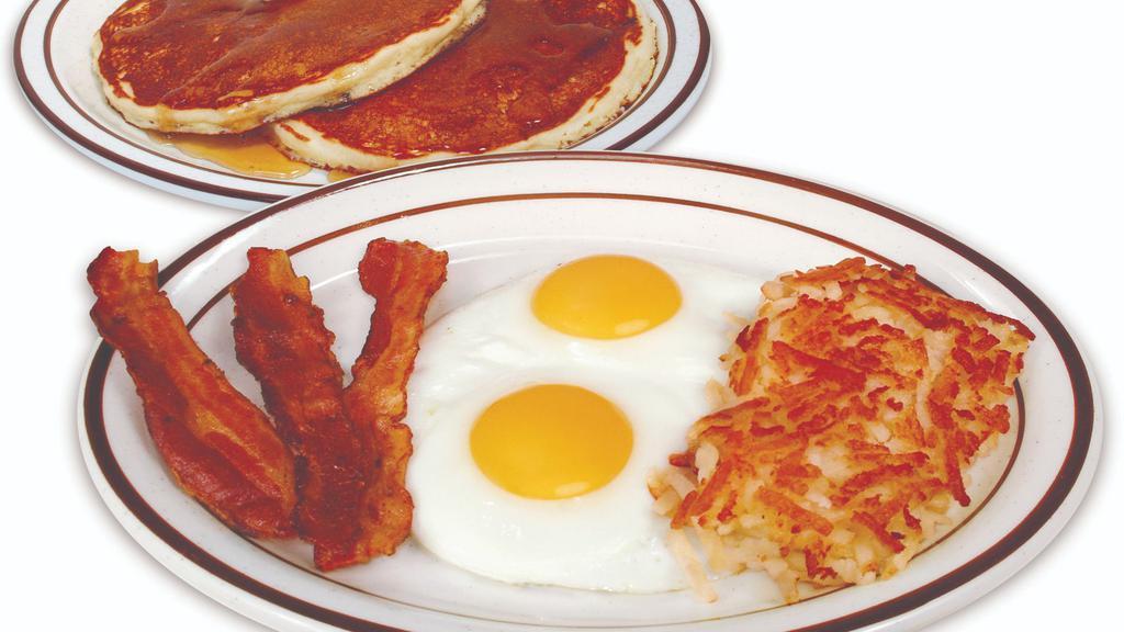 Big Webb Breakfast · Two eggs, hashbrowns, wheatcakes, and your choice of bacon, ham, or sausage links.