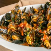 Zuppa Di Pesce · Shrimp, clams, scallops, mussels, calamari in a tomato broth served over angel hair pasta.