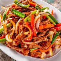 Mongolian Beef* · Beef tenderloin, sweet soy, garlic, peppers, onions, and green onions.