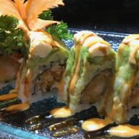 Alligator Roll · Spicy kani and shrimp tempura topped with avocado and cream cheese.