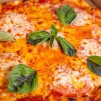 Classic Margherita · San marzano tomato, fresh mozzarella, basil.