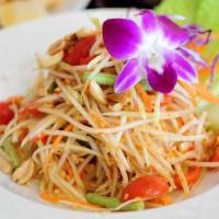 Papaya Salad (Thai Style) · Green papaya, carrots, tomatoes, green beans, peanuts, garlic, dried shrimp, spicy lime dres...