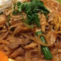 Pad Thai · Stir fried with thin rice noodles, red bean curd, crushed peanuts, bean sprouts, scallions a...
