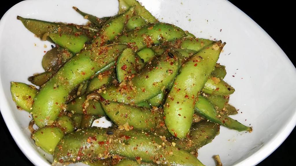 Garlic Chili Edamame · Spicy. Tossed in garlic and Japanese seven spices.