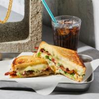 The Jalapeno Cheddar · Melted Cheddar and jack cheese with jalapeños and chipotle mayonnaise grilled between two sl...