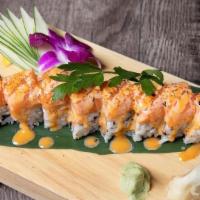 Alaskan Beauty Roll* · Spicy Salmon and Tempura Flakes inside, topped with Salmon, Chili Pepper and Spicy Mayo Sauce
