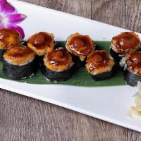 Volcano Roll* · Baked Roll with Spicy Tuna, Salmon, Tobiko and Scallions, Topped with Spicy Mayo Sauce, Eel ...