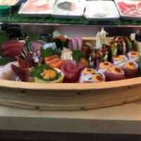 Oishii Sushi Boat* · 56 assorted pieces include: 26 pieces of assorted nigiri, 1 tuna roll, 1 shrimp tempura roll...